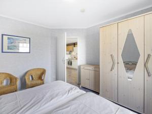 Voodi või voodid majutusasutuse Nordlicht - Ausblick toas