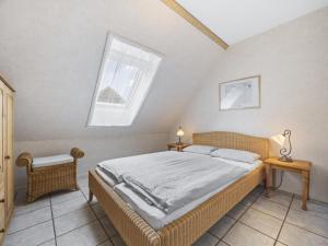 Voodi või voodid majutusasutuse Nordlicht - Windjammer toas