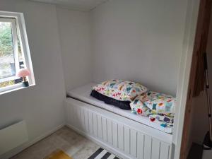 Ένα ή περισσότερα κρεβάτια σε δωμάτιο στο 4 star holiday home in Faxe Ladeplads