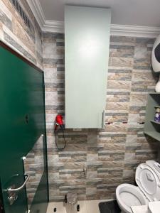 Koupelna v ubytování Flowsort Grand Apartments