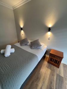 En eller flere senge i et værelse på Hotel Sky Center-Plaza de Osorno