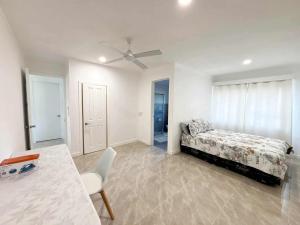 Ένα ή περισσότερα κρεβάτια σε δωμάτιο στο Toafa Elidad Airport Lodge