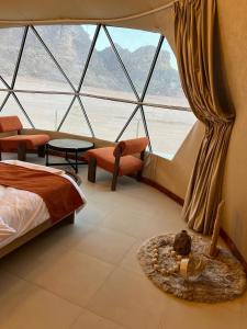 Ένα ή περισσότερα κρεβάτια σε δωμάτιο στο Rum Horizon Camp& Tours