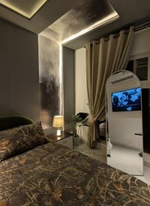 Ένα ή περισσότερα κρεβάτια σε δωμάτιο στο Midcity 1 BR, Condo, Gulberg Lahore Self Check IN