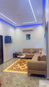 TV a/nebo společenská místnost v ubytování منتجع سيتي لاند 2