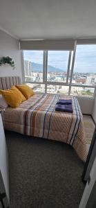 Postel nebo postele na pokoji v ubytování Departamento con vista privilegiada de la ciudad + 8 fotografií