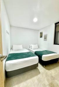 Ένα ή περισσότερα κρεβάτια σε δωμάτιο στο Apartamento de Lujo con Excelente Ubicación