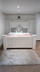 Ένα ή περισσότερα κρεβάτια σε δωμάτιο στο Shetcliffe Lodge