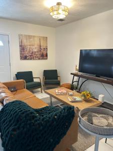 Un televizor și/sau centru de divertisment la Sunflower stays