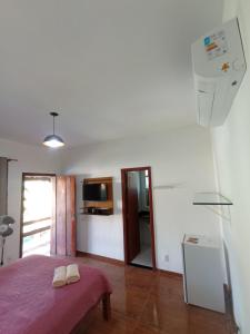 Η κουζίνα ή μικρή κουζίνα στο Estadia cipó