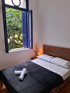 Ένα ή περισσότερα κρεβάτια σε δωμάτιο στο Florian's Hostel