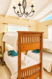 Ένα ή περισσότερα κρεβάτια σε δωμάτιο στο Hotel Aparts Cabañas Tierra de Glaciares