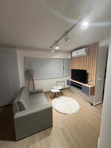 Et opholdsområde på Depto 6p , 1 dormitorio mas sofá cama en living