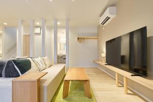 TV a/nebo společenská místnost v ubytování 星宿 Asahikawa Miyashita