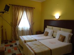 Hotel Konti客房内的一张或多张床位