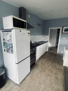 Kuchyň nebo kuchyňský kout v ubytování South Bay Rest