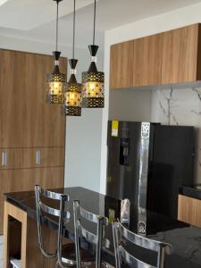 Köök või kööginurk majutusasutuses Apartamento con Piscina en Ricaurte