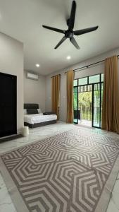 Postel nebo postele na pokoji v ubytování Rumah Singgah Jerteh