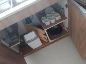 an overhead view of a small bathroom with a toilet at Selene in Villa Rumipal