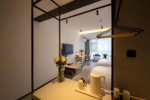 Fotografie z fotogalerie ubytování Zhangjiajie Clamshell Youth Hotel v destinaci Čang-ťia-ťie