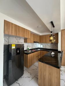 Köök või kööginurk majutusasutuses Apartamento con Piscina en Ricaurte