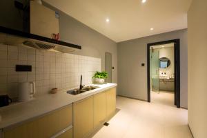 Fotografie z fotogalerie ubytování Zhangjiajie Clamshell Youth Hotel v destinaci Čang-ťia-ťie + 33 fotografií