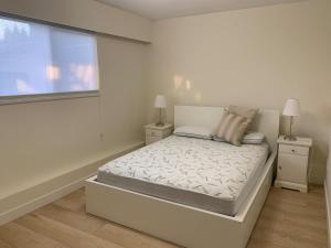 Ένα ή περισσότερα κρεβάτια σε δωμάτιο στο Modern 2-Bedroom suite
