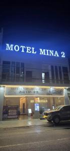 a car parked in front of a motel milina at Mina Motel 2 in Thuan An