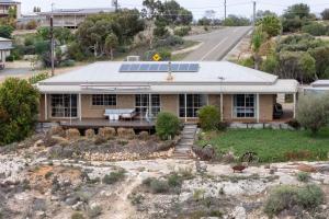 a house with solar panels on the roof at River Murray Views in Nildottie