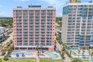 an aerial view of a hotel and two tall buildings at Roxanne Towers Remodeled with Amazing Views,Pools! in Myrtle Beach