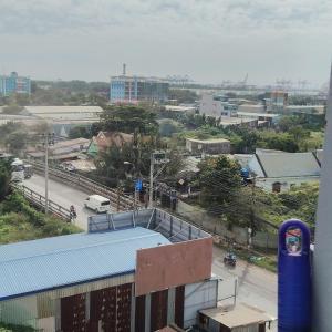a view of a city with a building and a street at Song Đạt Hotel in Tân Ðiền