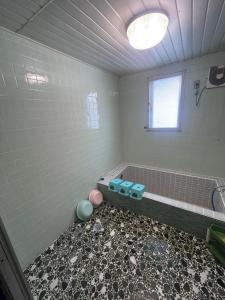 Vannituba majutusasutuses 山の家白滝