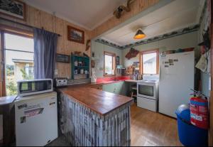 Η κουζίνα ή μικρή κουζίνα στο Mountains Edge Cabins