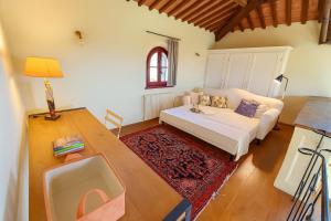 Postel nebo postele na pokoji v ubytování La Torretta + 11 fotografií