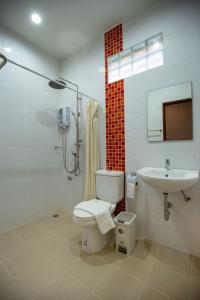 a bathroom with a toilet and a sink at Lazy shot in Ban San Ton Ko (1) +31 photos
