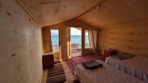 Postel nebo postele na pokoji v ubytování Leley Camp