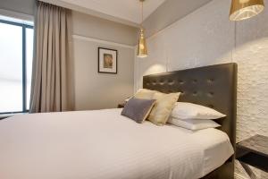 Postel nebo postele na pokoji v ubytování Explore the Blue Mountains on foot