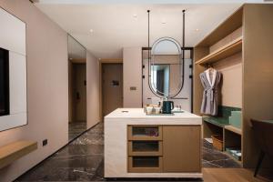 Galería fotográfica de Ramada Plaza By Wyndham Wuhan Hanyang en Wuhan 19 fotos más