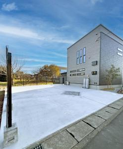 a large brick building with a large parking lot at 8Room - Vacation STAY 70870v in Yachimata