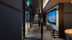 TV a/nebo společenská místnost v ubytování Stay Passport Okinawa Ryokan Incheon Bupyeong