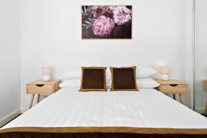 Postel nebo postele na pokoji v ubytování Executive and Spacious Apartment with Balcony