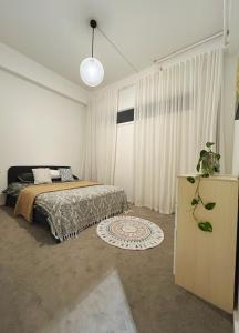 En eller flere senge i et værelse på Large apartment city center