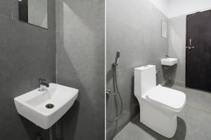 Ένα μπάνιο στο Townhouse Oak Nagaram Lake Hyderabad