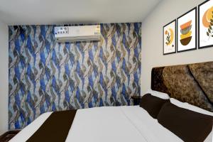 Ένα ή περισσότερα κρεβάτια σε δωμάτιο στο Super Townhouse Oak Q-City Techno Park +22 φωτογραφίες