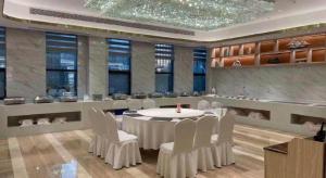 Restaurace v ubytování Ningbo East Shipu Hotel