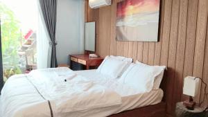 Ένα ή περισσότερα κρεβάτια σε δωμάτιο στο Sunrise Hill Koh Rong