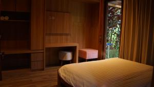 Ένα ή περισσότερα κρεβάτια σε δωμάτιο στο Eusabeia Villa And Hot Spring Water +56 φωτογραφίες