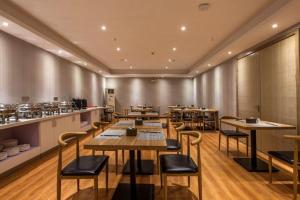 Restaurace v ubytování Borrman Hotel Wuhan Yangluo Metro Station Shenshuigang