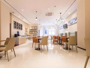 TV a/nebo společenská místnost v ubytování City Comfort Inn Nanning International Exhibition Jinhu Plaza