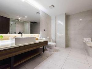 Ένα μπάνιο στο James Joyce Coffetel Jilin Railway Station Fortune Plaza +258 φωτογραφίες